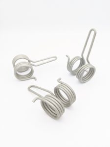 Double Torsion Spring Made with Music Coated Wire